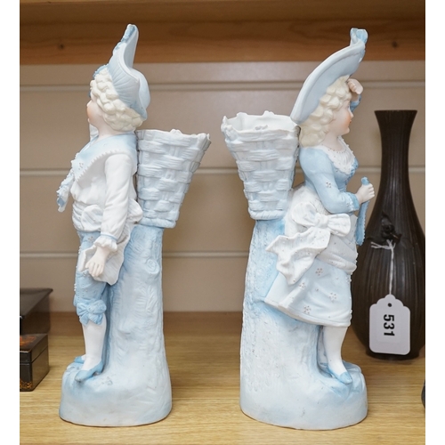 532 - A pair of 19th century German figurative bisque spill vases, 30cm high. Condition - good