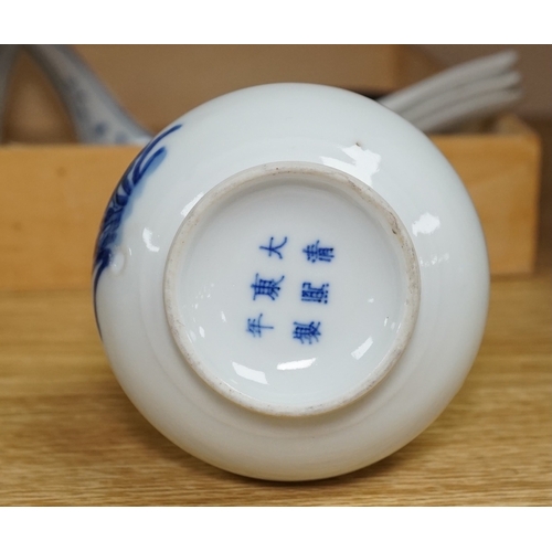 535 - A small Chinese porcelain blue and white vase, Republic period, on a hardwood stand and various soup... 