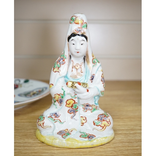 537 - A Japanese porcelain seated figure of Kwannon, a flambé vase and a figural saucer dish,  saucer dish... 