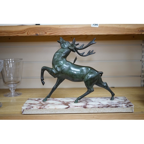 539 - A bronze model of a stag raised on rectangular marble base, 45cm wide. Condition - good