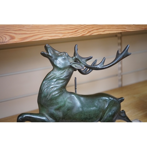 539 - A bronze model of a stag raised on rectangular marble base, 45cm wide. Condition - good