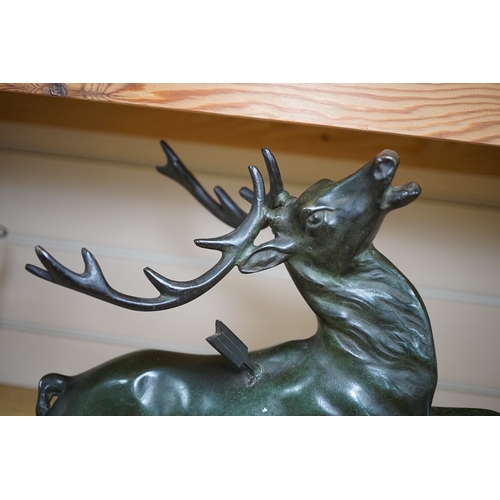 539 - A bronze model of a stag raised on rectangular marble base, 45cm wide. Condition - good