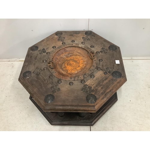 55 - An Indian iron mounted octagonal hardwood brazier table, width 92cm, height 48cm. Condition - poor... 