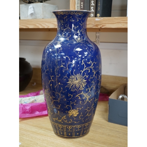 559 - A Chinese gilt decorated blue glazed vase, early 19th century, 48.5cm high. Condition - one side has... 