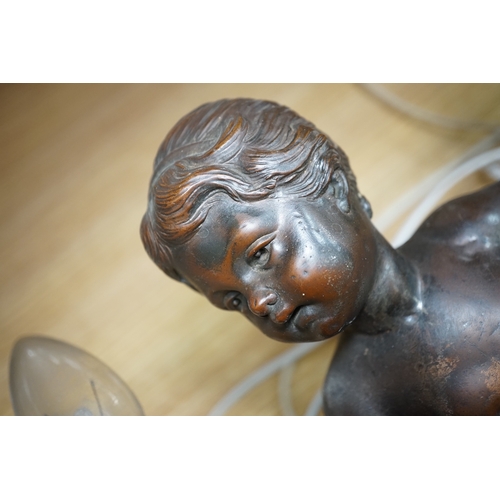 564 - A pair of cast metal caryatid putti two light wall sconces, 45cm high. Condition - poor