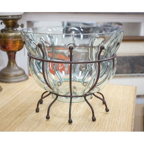 566 - A glass vase and a similar bowl with wrought iron stand, vase 38cm high. Condition - good