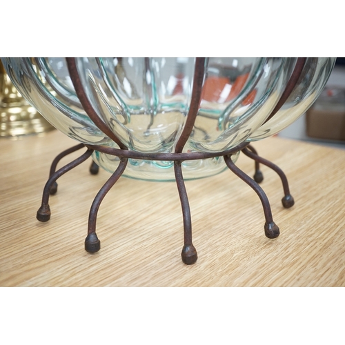 566 - A glass vase and a similar bowl with wrought iron stand, vase 38cm high. Condition - good