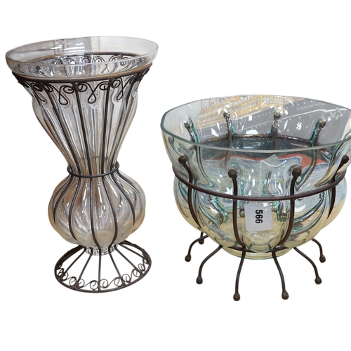 566 - A glass vase and a similar bowl with wrought iron stand, vase 38cm high. Condition - good