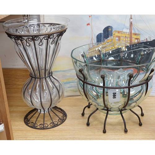 566 - A glass vase and a similar bowl with wrought iron stand, vase 38cm high. Condition - good