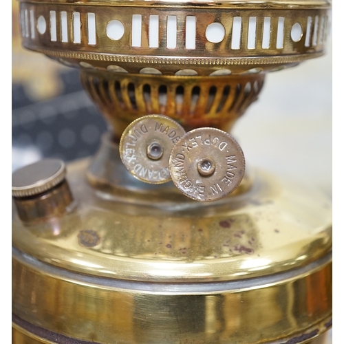 568 - Two Victorian brass oil lamps with white glass shades, 50cm high including funnel. Condition - one t... 