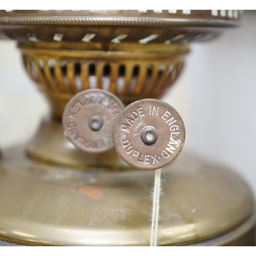 568 - Two Victorian brass oil lamps with white glass shades, 50cm high including funnel. Condition - one t... 