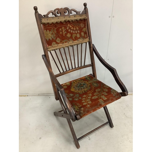 57 - A Victorian folding chair with carpet upholstery and a Regency mahogany elbow chair. Condition - poo... 