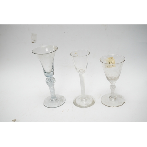 570 - Three 18th century air twist stemmed wine glasses, tallest 16.5cm high. Condition - two having chips... 