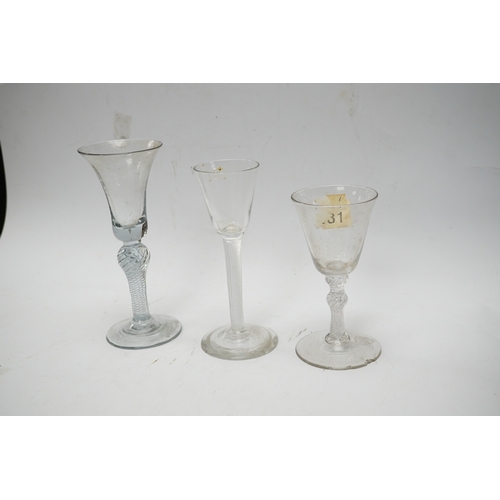 570 - Three 18th century air twist stemmed wine glasses, tallest 16.5cm high. Condition - two having chips... 