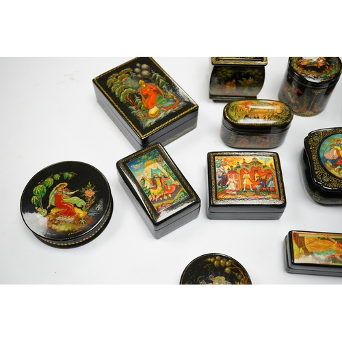 577 - A quantity of Russian lacquer boxes decorated with figures and mythical scenes, largest 10cm in leng... 