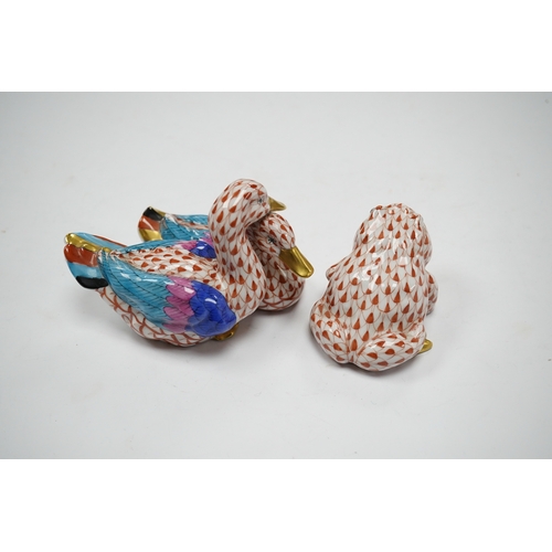 579 - Two porcelain Herend red scale animal figures comprising a duck group and a toad, largest 11cm wide.... 