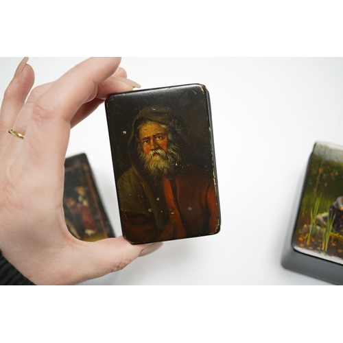 584 - Four late 19th/early 20th century Russian lacquer boxes, largest 10.5cm. Condition - fair to good... 