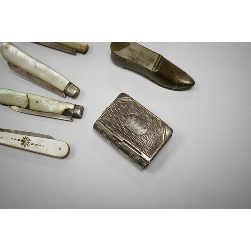 595 - Four mother-of-pearl penknives, two vesta cases and a treen shoe, treen shoe 10cm long. Condition - ... 