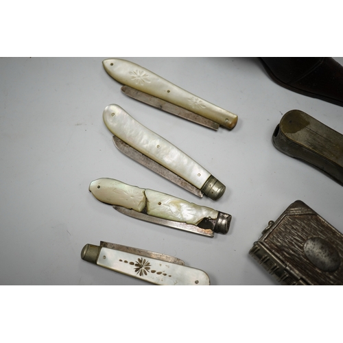 595 - Four mother-of-pearl penknives, two vesta cases and a treen shoe, treen shoe 10cm long. Condition - ... 