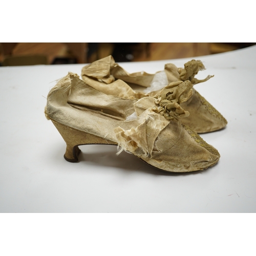 597 - A pair of 18th century cream silk and embroidered ladies shoes together with a later 19th century si... 