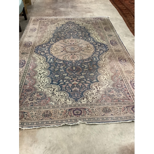 60 - A North West Persian ivory ground carpet, 290 x 200cm. Condition - poor to fair