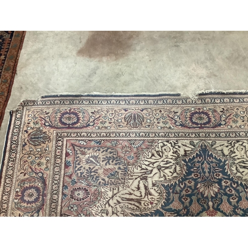 60 - A North West Persian ivory ground carpet, 290 x 200cm. Condition - poor to fair