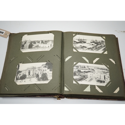 600 - Two early 20th century topographical postcard albums. Condition - poor to fair to good