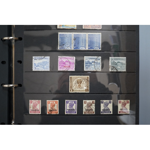 602 - A four albums of mixed stamps, including world and commonwealth, first day covers and an empty album... 