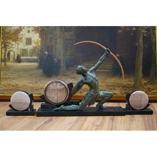 610 - A French Art Deco spelter and marble archer clock garniture, 60.5cm wide, 51.5cm high. Condition -... 