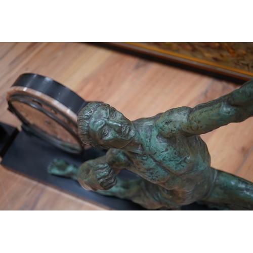 610 - A French Art Deco spelter and marble archer clock garniture, 60.5cm wide, 51.5cm high. Condition -... 