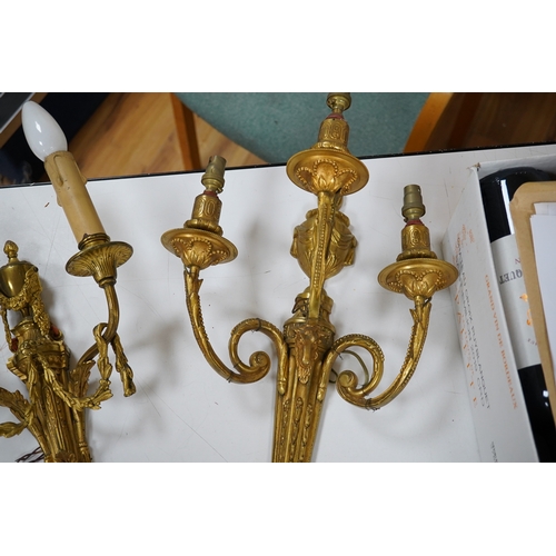 614 - Two early 20th century ormolu wall sconces, largest 44cm. Condition - fair to good