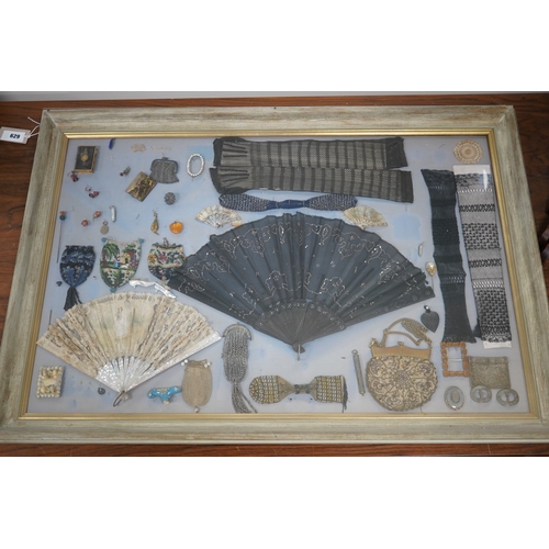 629 - A framed display montage of late 18th and 19th century decorative ladies sequin and lace fans, beadw... 