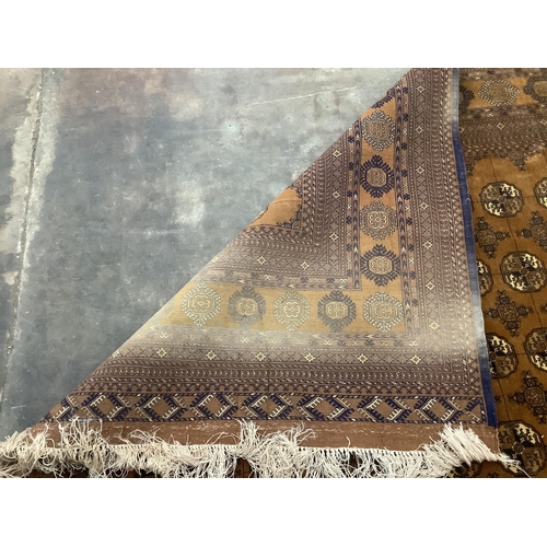 64 - A Bokhara carpet, 310 x 210cm. Condition - fair