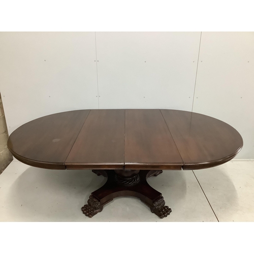 66 - A George IV style circular mahogany extending dining table, 224cm extended, two spare leaves, width ... 