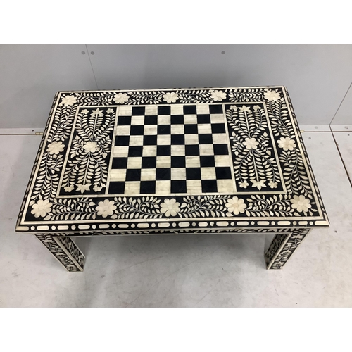 67 - A rectangular faux ivory inlaid low games table, width 92cm, depth 42cm, height 36cm. Condition - fa... 