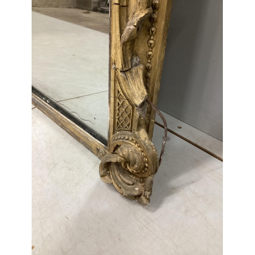 7 - A Victorian giltwood and composition overmantel mirror with cartouche pediment, width 140cm, height ... 