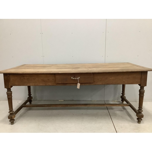 74 - A 19th century French rectangular oak kitchen table, one side drawer and two end drawers, width 199c... 