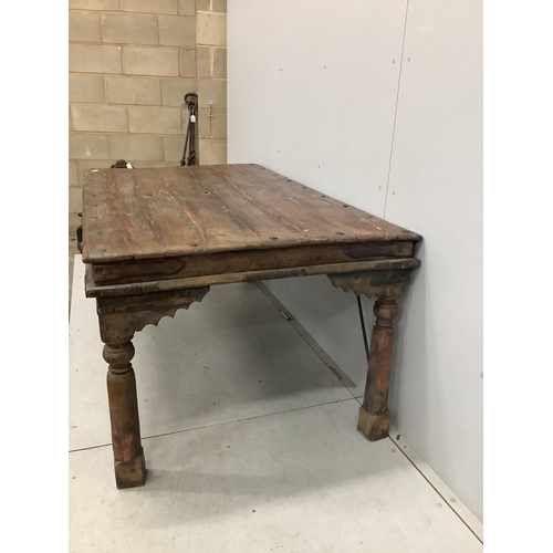 79 - An Indian iron mounted rectangular hardwood table, width 182cm, depth 106cm, height 79cm. Condition ... 