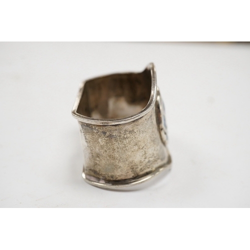 830 - An Edwardian silver and enamelled napkin ring, by Liberty & Co, Birmingham, 1907, 52mm. Condition - ... 