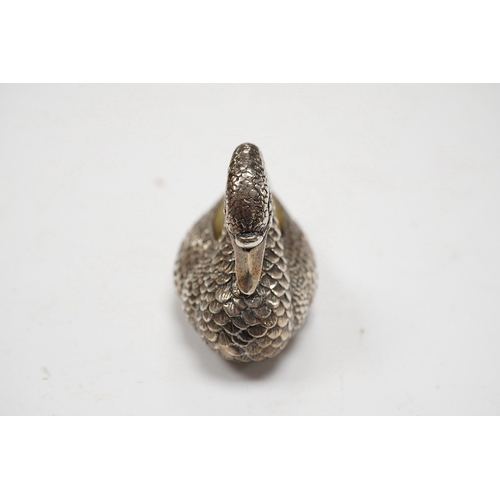 831 - A modern silver mounted swan pin cushion, Ari D Norman, London, 1988, length 59mm. Condition - fair... 