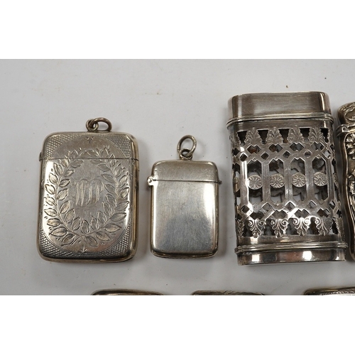 833 - Seven assorted late 19th/early 20th century silver vesta cases, largest 48mm, a sterling case and on... 