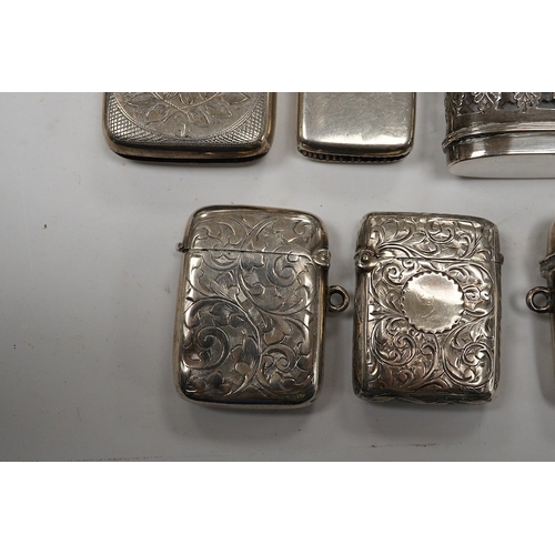 833 - Seven assorted late 19th/early 20th century silver vesta cases, largest 48mm, a sterling case and on... 