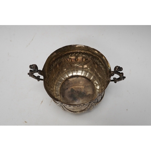 841 - A late Victorian repousse silver porringer, maker JR, London 1884, height 82mm, 3.8oz. Condition - p... 