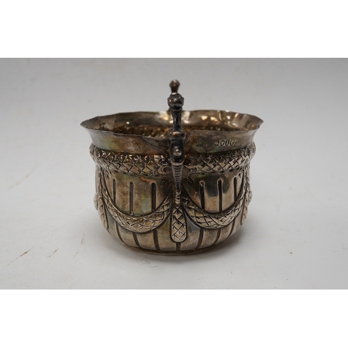 841 - A late Victorian repousse silver porringer, maker JR, London 1884, height 82mm, 3.8oz. Condition - p... 