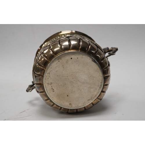 841 - A late Victorian repousse silver porringer, maker JR, London 1884, height 82mm, 3.8oz. Condition - p... 