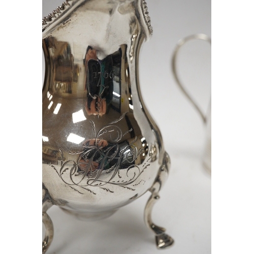 849 - A George III silver cream jug, marks rubbed, a George III silver christening mug, London, 1801 and a... 