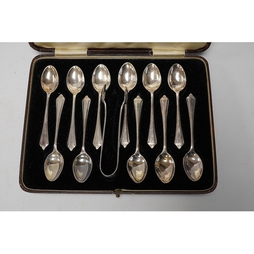 852 - A 1960's silver Guernsey milk can, by Kenneth Tyler Key,  height 16cm and two cased sets of spoons (... 