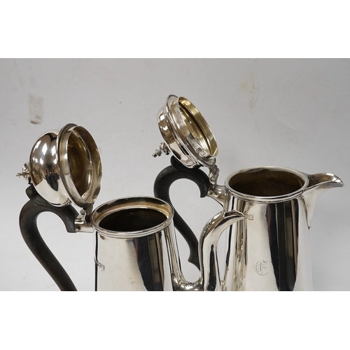 855 - Two Edwardian silver cafe au lait pots, Pearce & Sons, London, 1908 and Nathan & Hayes, Chester, 190... 