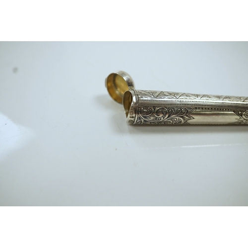 857 - A 9ct gold mounted amber cigarette holder, 78mm, in a silver case. Condition - fair