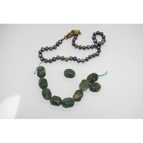 900 - A large collection of bead necklaces and unmounted turquoise and baroque pearls. Condition - fair... 